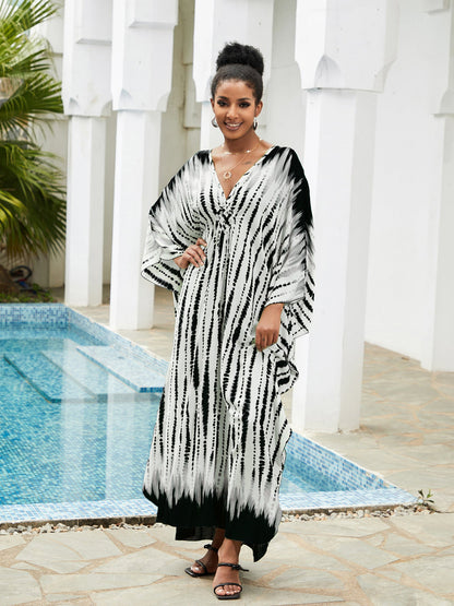 Ladies Maxi Beach Dress with Deep V-Neck and Playful Slit Ivyshape