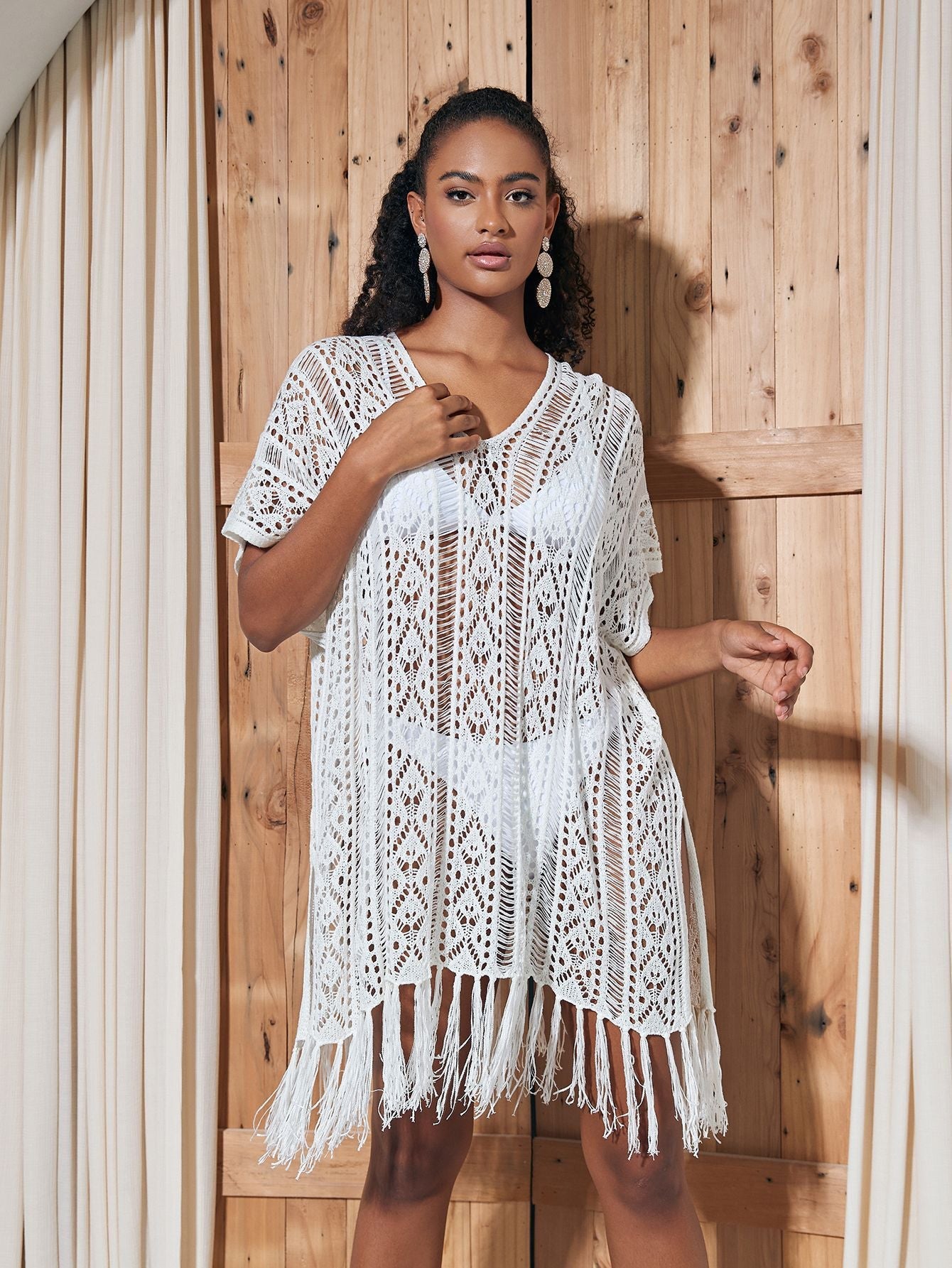 Women's crochet beach cover-up with fringed details and delicate pattern Ivyshape