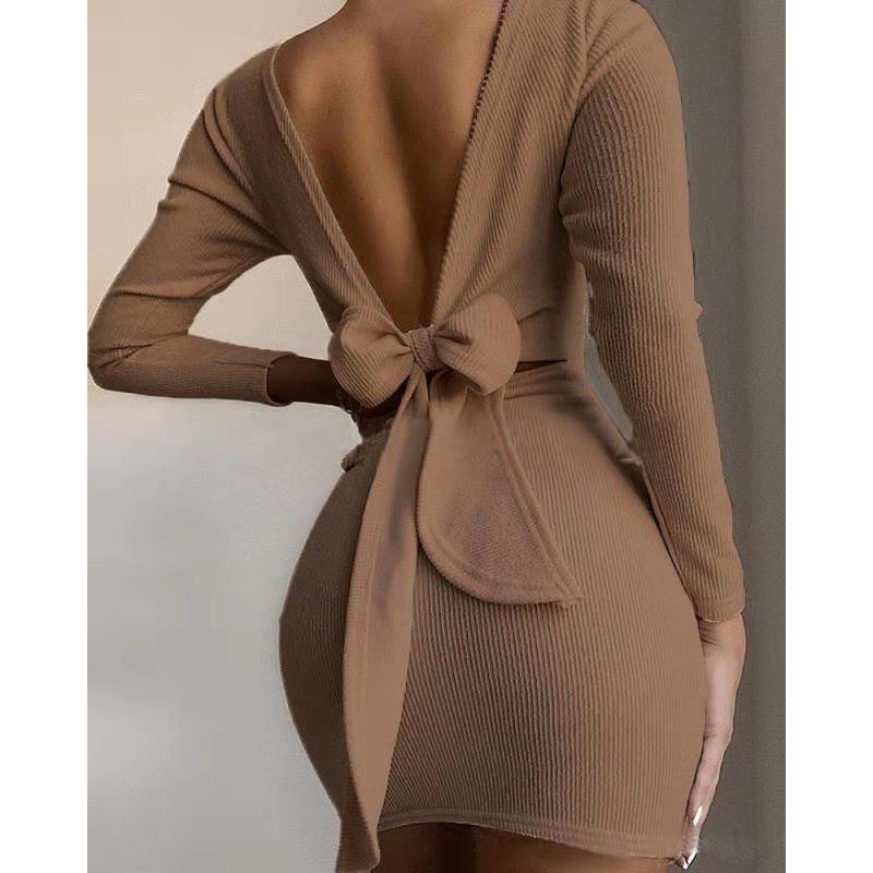 Women fitted mini dress with deep V-neck and bow detail Ivyshape