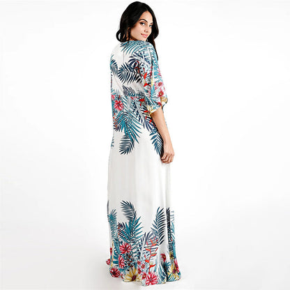 Women's beach tunic with cheerful floral pattern and loose fit Ivyshape