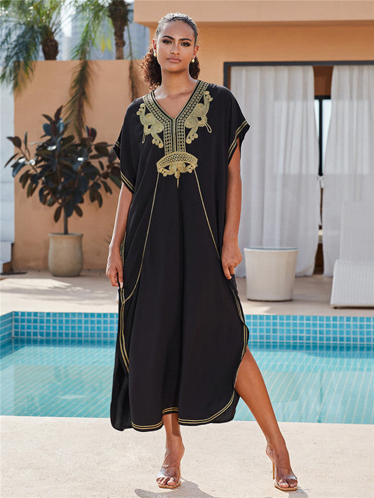 Women’s beach kaftan with intricate embroidery details and asymmetric hem Ivyshape