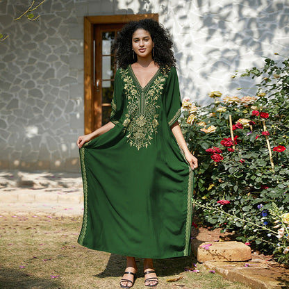 Women's kaftan dress with intricate golden border and elegant V-neck Ivyshape