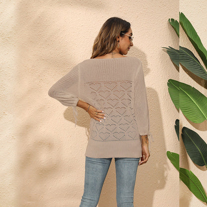 Ladies knit top with heart-shaped hole pattern and playful sleeves Ivyshape