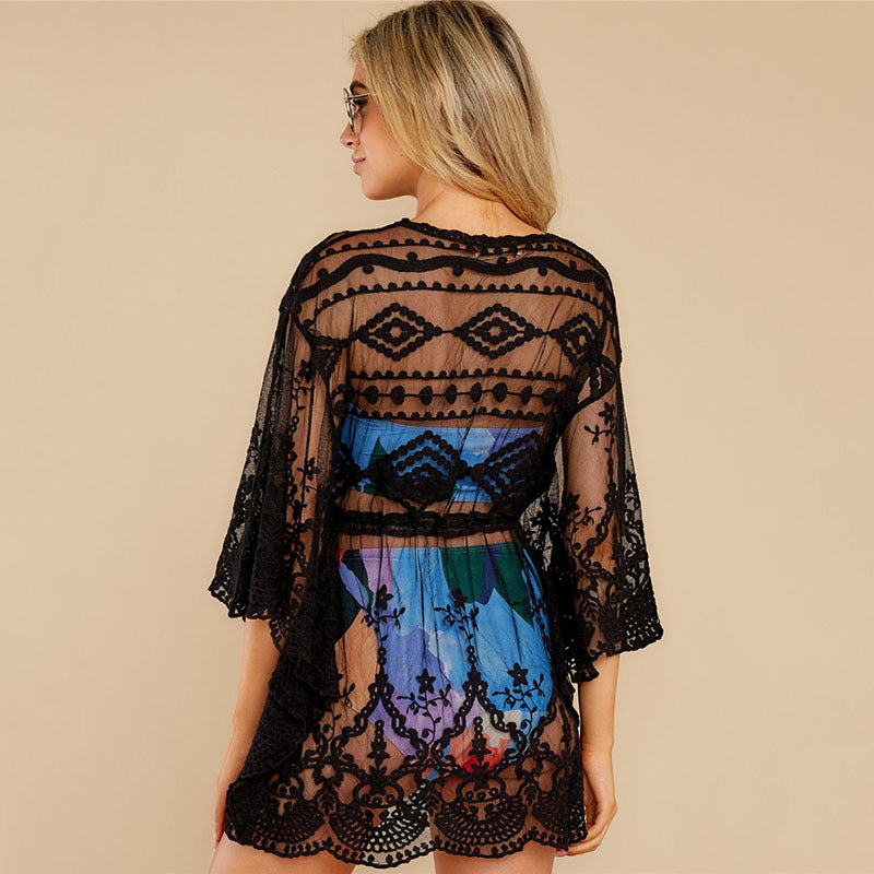 Ladies airy crochet beach cover-up with delicate flower appliqués Ivyshape