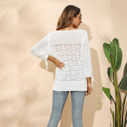 Ladies knit top with heart-shaped hole pattern and playful sleeves Ivyshape