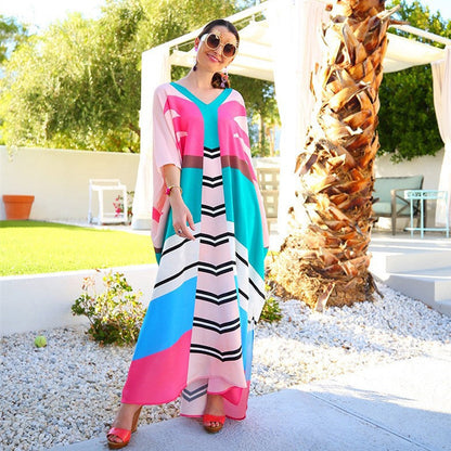 Women's beach caftan with asymmetrical color design and deep V-neck Ivyshape