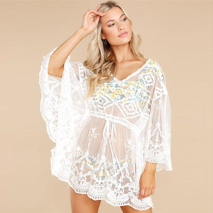 Ladies airy crochet beach cover-up with delicate flower appliqués Ivyshape