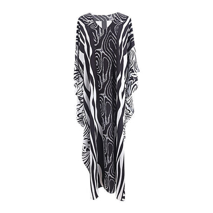 Ladies elegant kaftan with artistic zebra pattern and glittering accents Ivyshape