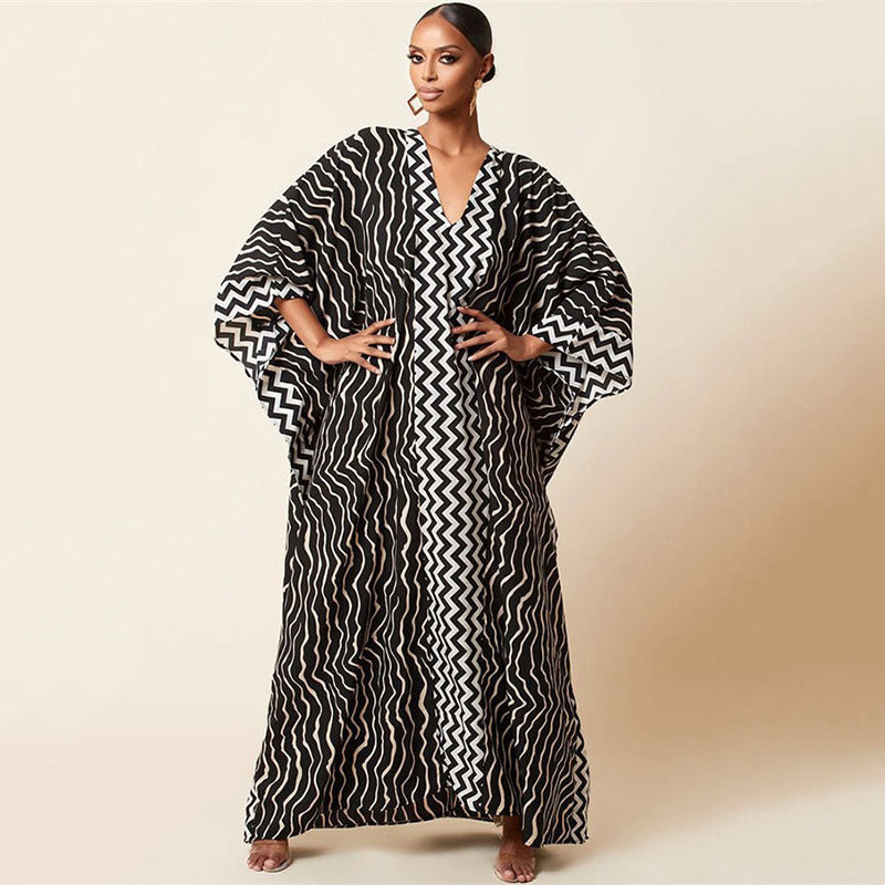 Ladies elegant kaftan with artistic zebra pattern and glittering accents Ivyshape