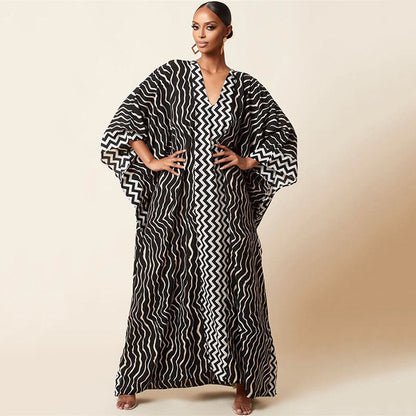 Ladies elegant kaftan with artistic zebra pattern and glittering accents Ivyshape
