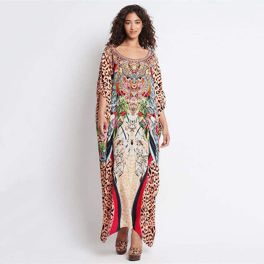 Ladies beach dress in stylish animal print and elegant accents Ivyshape