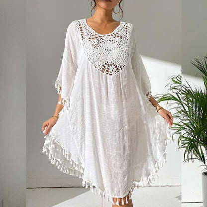 Women's lightweight beach cover-up with intricate crochet accents and fringe details Ivyshape