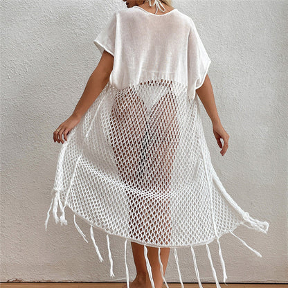 Women’s beach cover-up with elegant crochet pattern and fringed accents Ivyshape