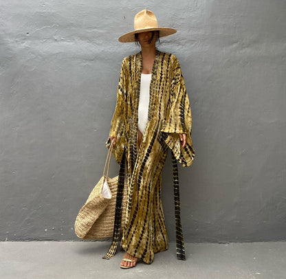 Women's elegant kaftan with playful batik pattern Ivyshape