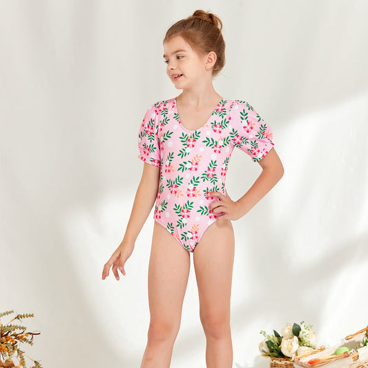 Girl's one-piece swimsuit with puff sleeves and floral design Ivyshape