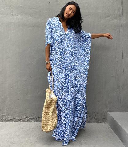 Women’s maxi dress with asymmetrical cut and animal print Ivyshape