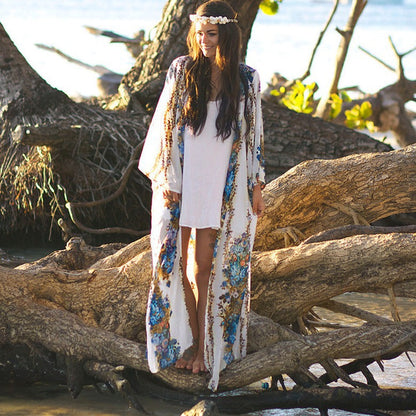 Women’s beach cover-up with floral accents and loose silhouette Ivyshape