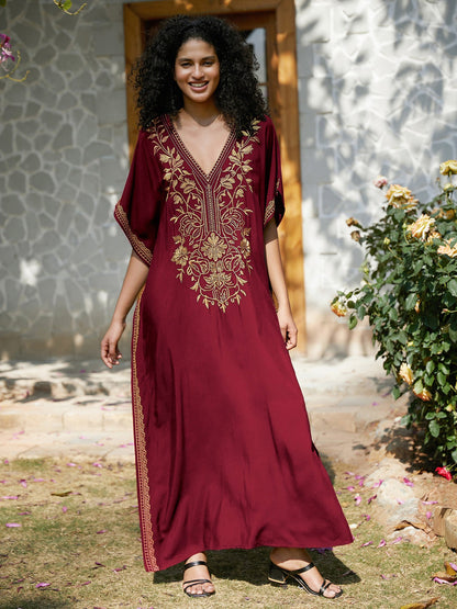 Women's kaftan dress with intricate golden border and elegant V-neck Ivyshape