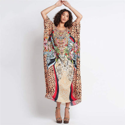 Ladies beach dress in stylish animal print and elegant accents Ivyshape