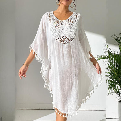 Women's lightweight beach cover-up with intricate crochet accents and fringe details Ivyshape