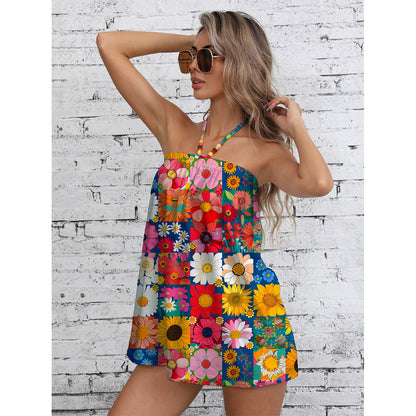 Ladies summer jumpsuit with colorful floral pattern and stylish strap design Ivyshape