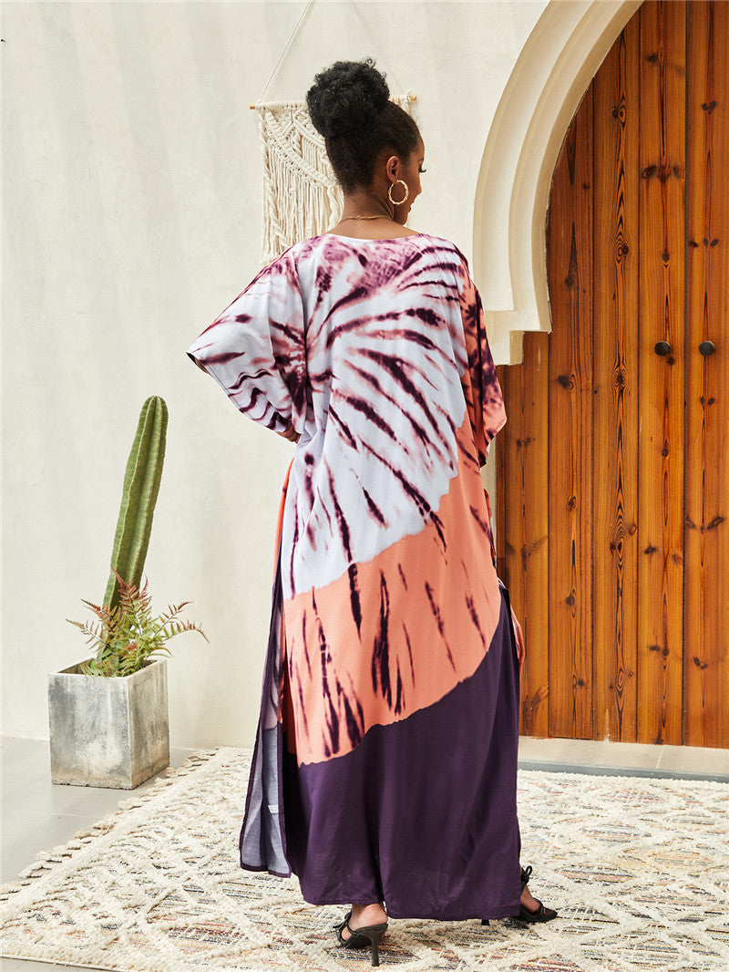 Ladies Kaftan dress with colorful batik pattern and flowing cut Ivyshape