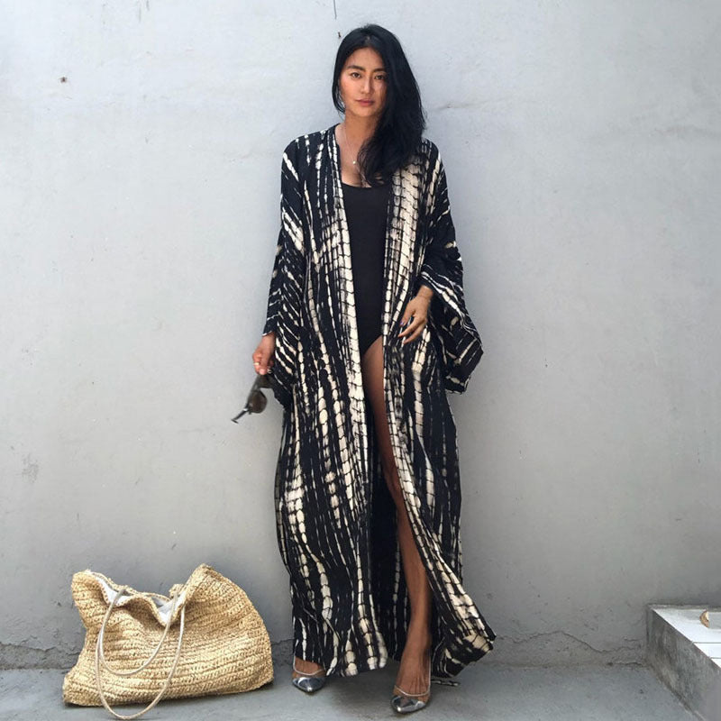 Women's elegant kaftan with playful batik pattern Ivyshape