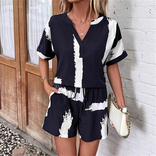 Women's short-sleeve jumpsuit with modern graphic print Ivyshape