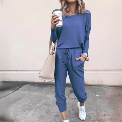 Women casual jumpsuit made of soft flowing material with practical pockets and rib knitted details Ivyshape