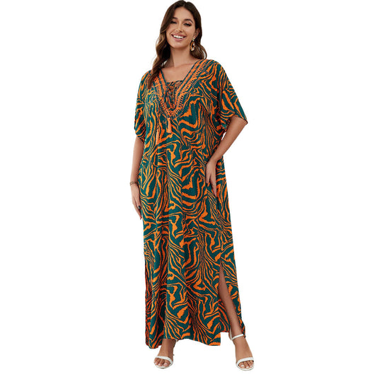 Women's maxi dress with colorful animal motif and elegant V-neck Ivyshape