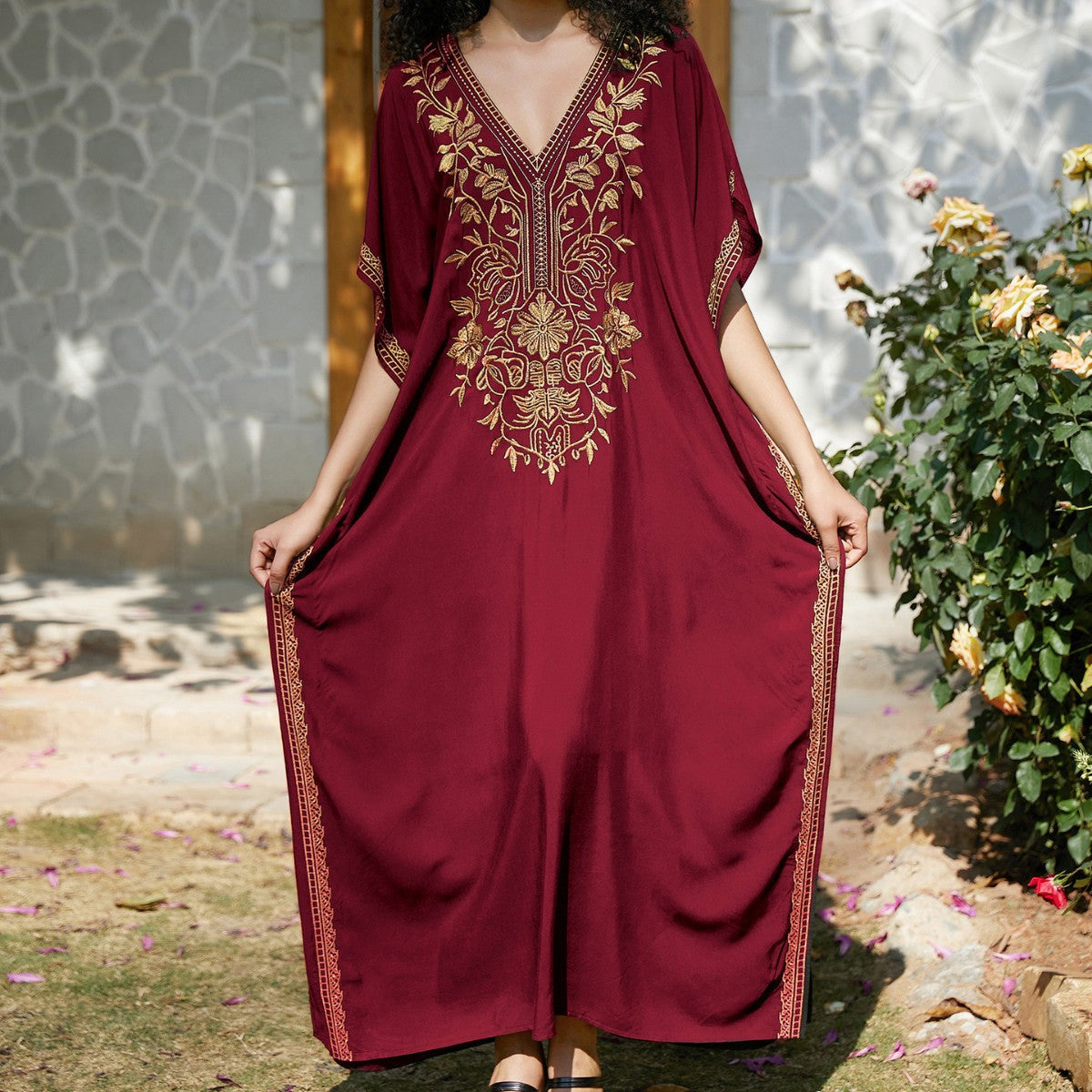 Women's kaftan dress with intricate golden border and elegant V-neck Ivyshape