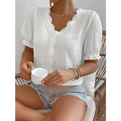 Ladies relaxed V-neck blouse with ruffle details Ivyshape