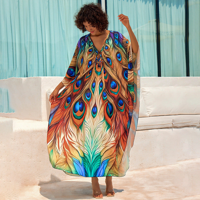 Women's beach dress with striking floral pattern design and flared cut Ivyshape