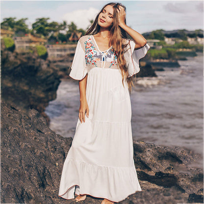 Women's maxi beach dress with floral appliqués and romantic neckline Ivyshape