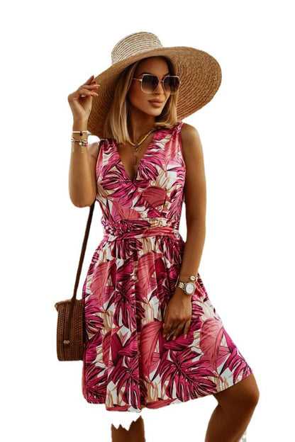 Women's casual dress with sophisticated wrap design and colorful leaf print Ivyshape