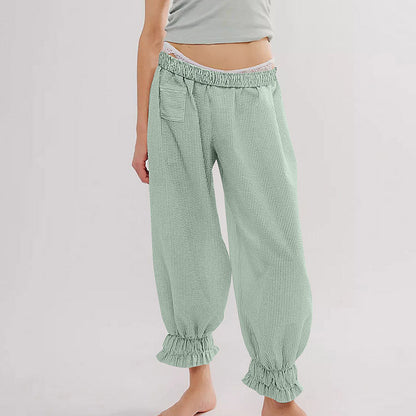 Women’s casual striped pants with elastic waistband and ruffle details Ivyshape