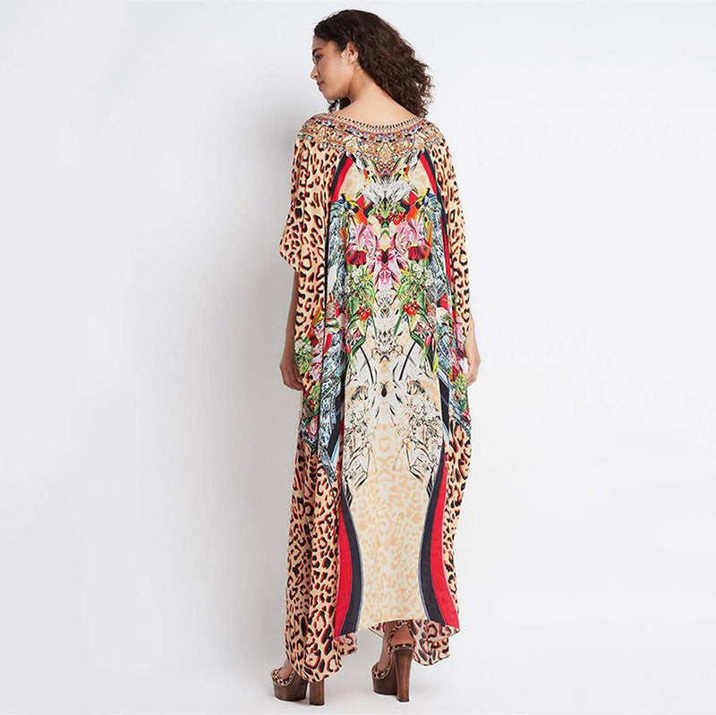 Ladies beach dress in stylish animal print and elegant accents Ivyshape