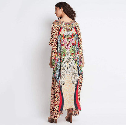 Ladies beach dress in stylish animal print and elegant accents Ivyshape