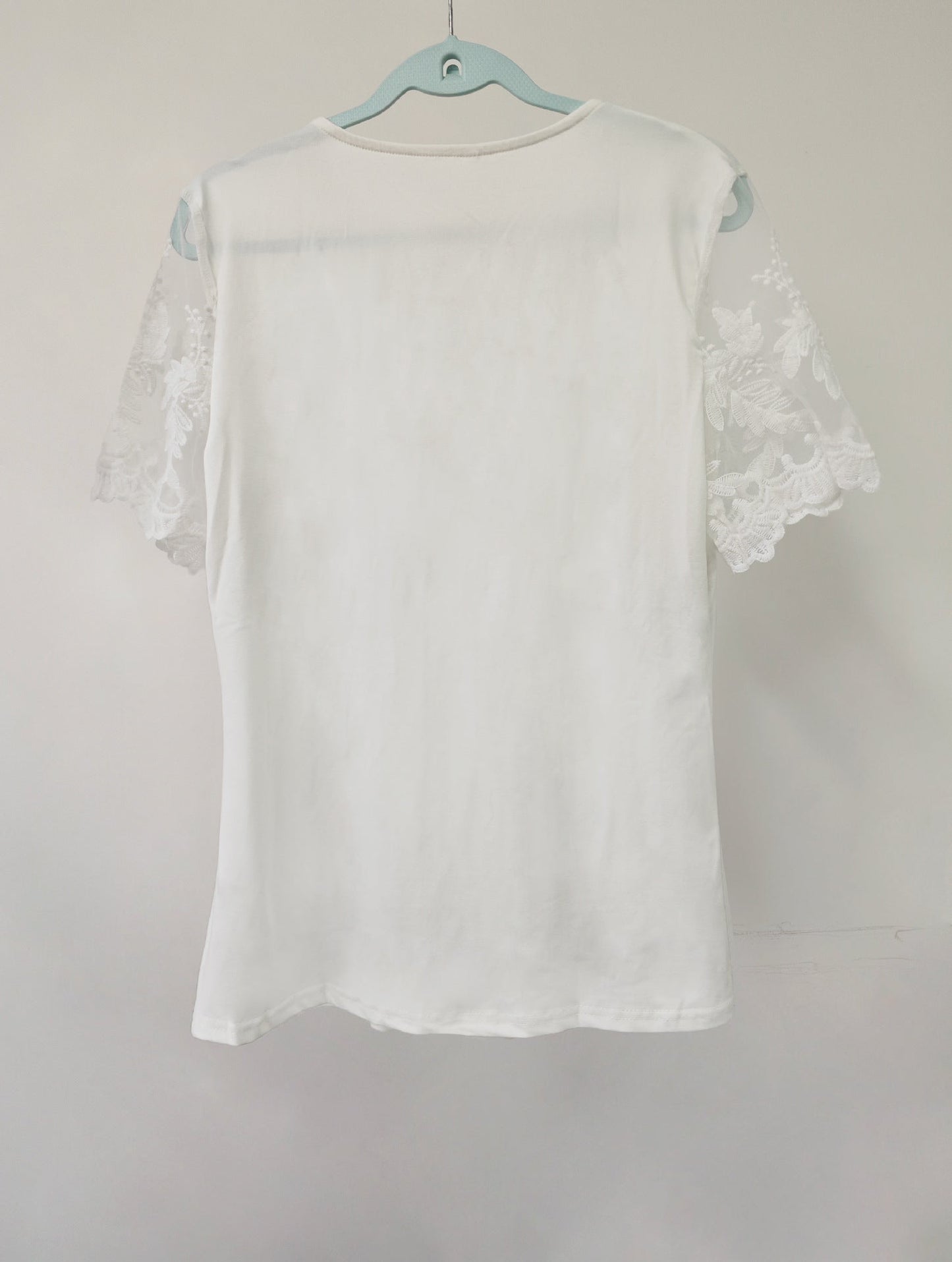 Ladies blouse with lace details and pleats Ivyshape