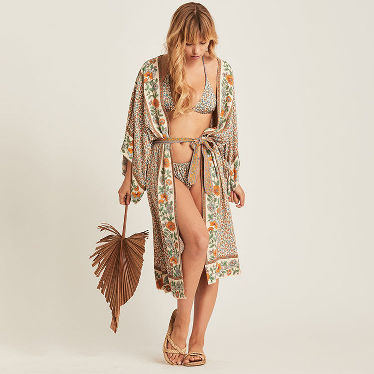 Women's beach robe with colorful floral pattern and elegant cut Ivyshape
