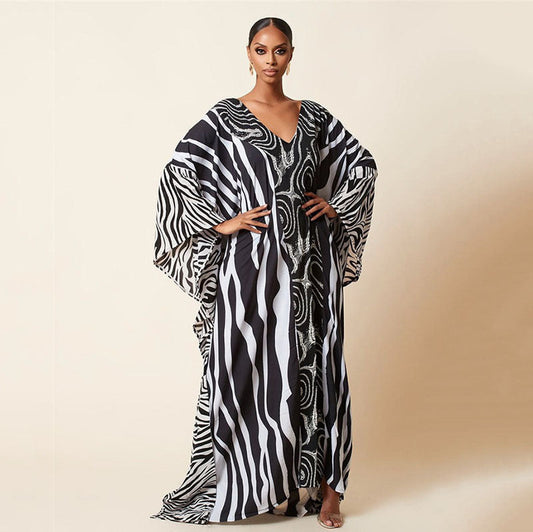Ladies elegant kaftan with artistic zebra pattern and glittering accents Ivyshape