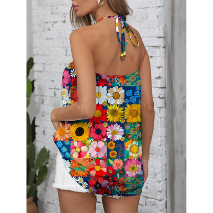 Ladies summer jumpsuit with colorful floral pattern and stylish strap design Ivyshape