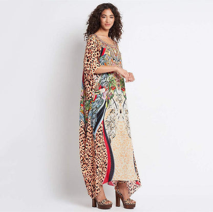 Ladies beach dress in stylish animal print and elegant accents Ivyshape