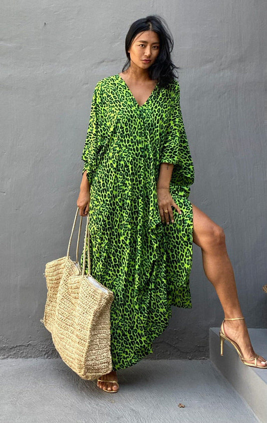 Women’s maxi dress with asymmetrical cut and animal print Ivyshape