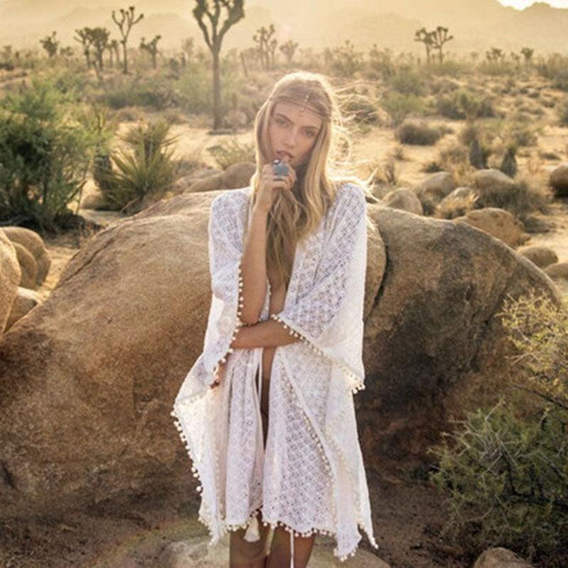 Women's elegant crochet beach cover-up with playful tassels Ivyshape