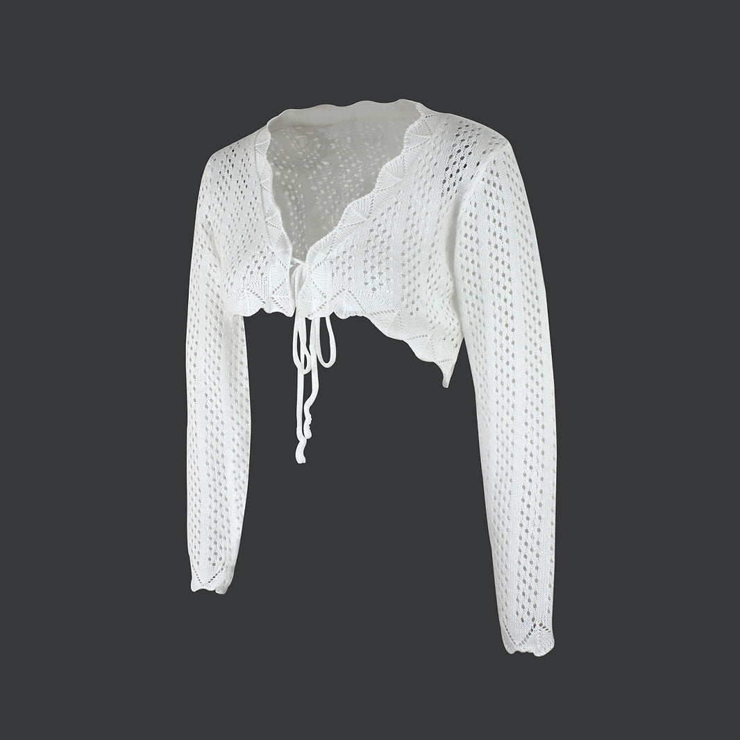 Women's cropped knitted blouse with tie closure and pierced design Ivyshape