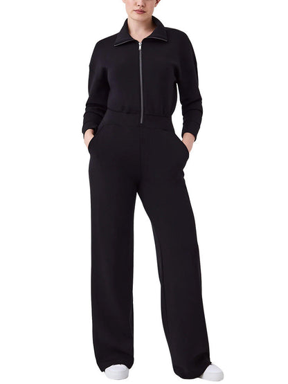 Women's sporty jumpsuit with high collar and practical pockets Ivyshape