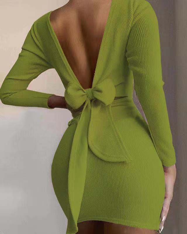 Women fitted mini dress with deep V-neck and bow detail Ivyshape