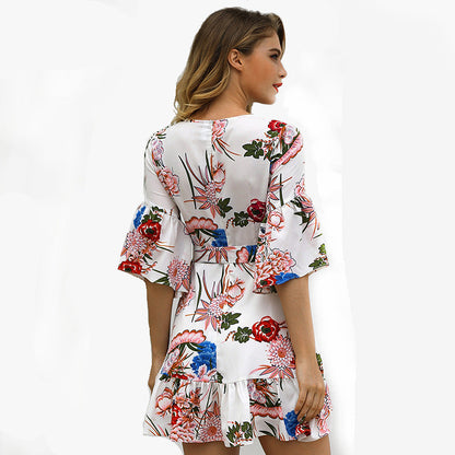 Ladies wrap dress with floral ruffle details and elegant hem Ivyshape