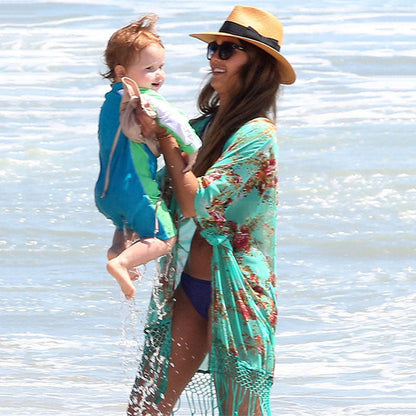 Ladies Trendy Beach Kimono with intricate floral pattern and fringed details Ivyshape